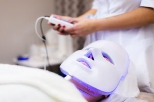 client-lies-salon-cosmetology-table-with-white-mask-her-face_343596-4301