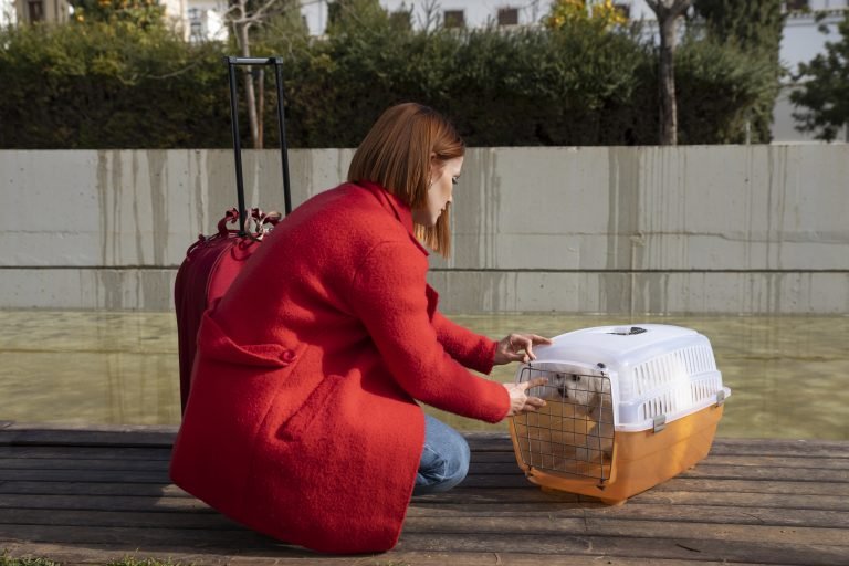full-shot-woman-with-pet-carrier