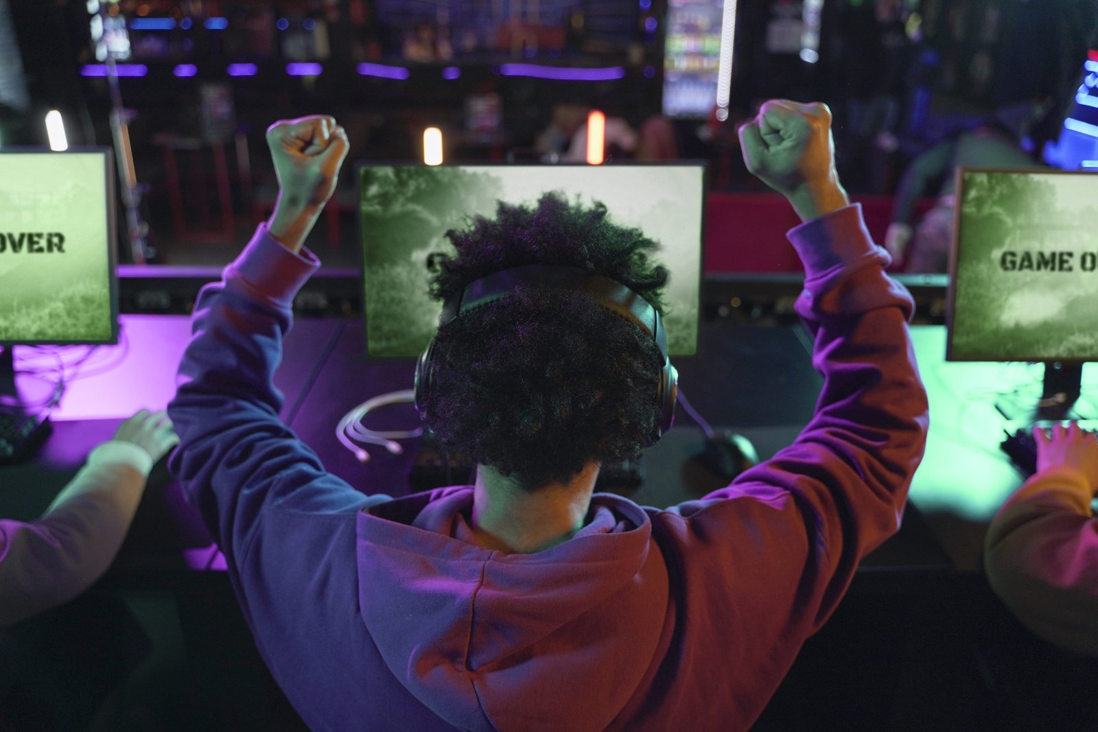 back-view-man-winning-videogame