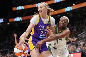 Cameron Brink #22 of the Los Angeles Sparks dribbles the ball while defended by Ezi Magbegor #13 of the Seattle Storm during the first half at Climate Pledge Arena on August 1, 2025, in Seattle, Washington. LandonBuford.com