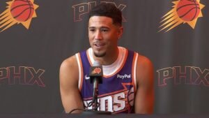 Devin Booker and Cooper Flagg prepare to face off as the Suns take on the Mavericks in Dallas.
