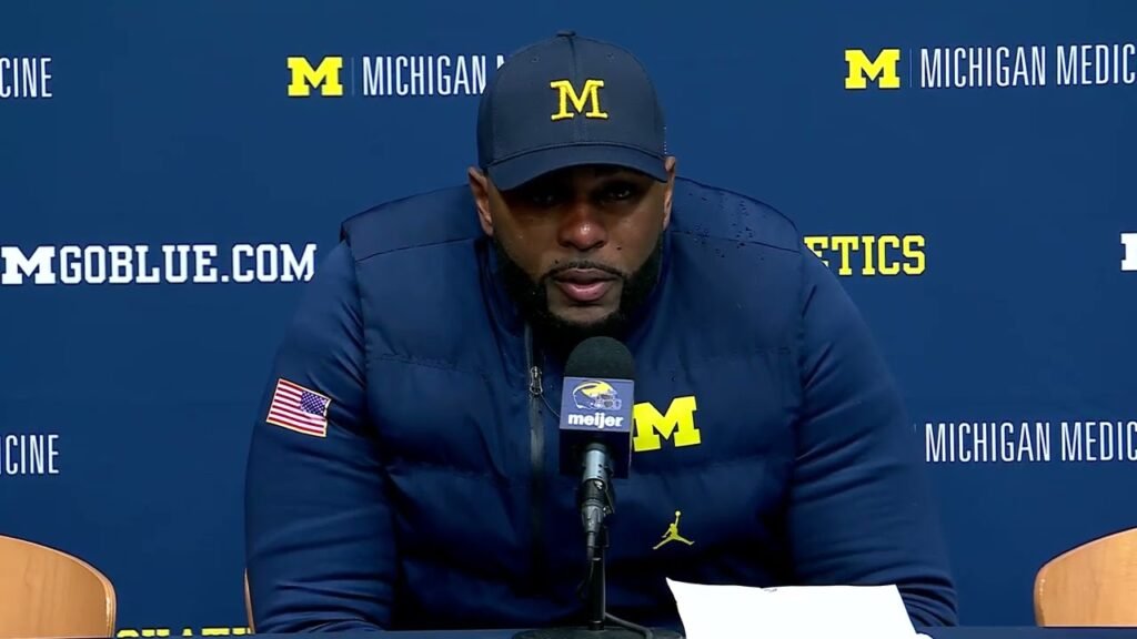 Sherrone Moore on the Michigan sideline during a game.