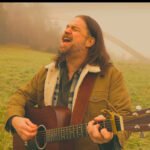 Matt Burke navigates the perilous road of independence in “Coming Down the Mountain”