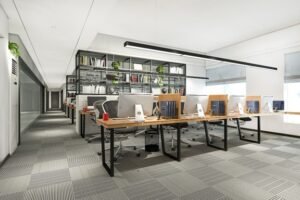 Modern office interior with collaborative spaces and ample natural light
