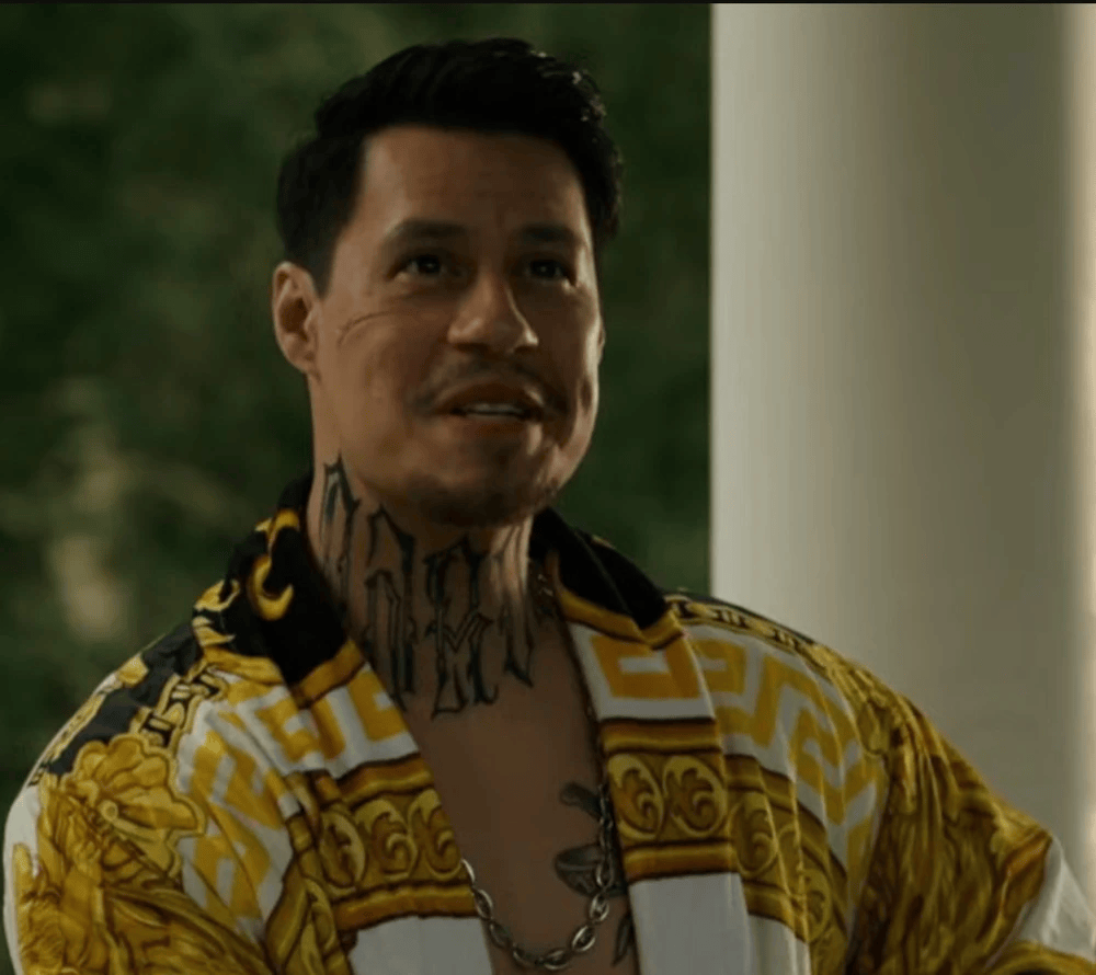 Roberto Ortega, leader of the Marquez cartel, depicted in a dramatic, cinematic still as a menacing Chicago drug lord.