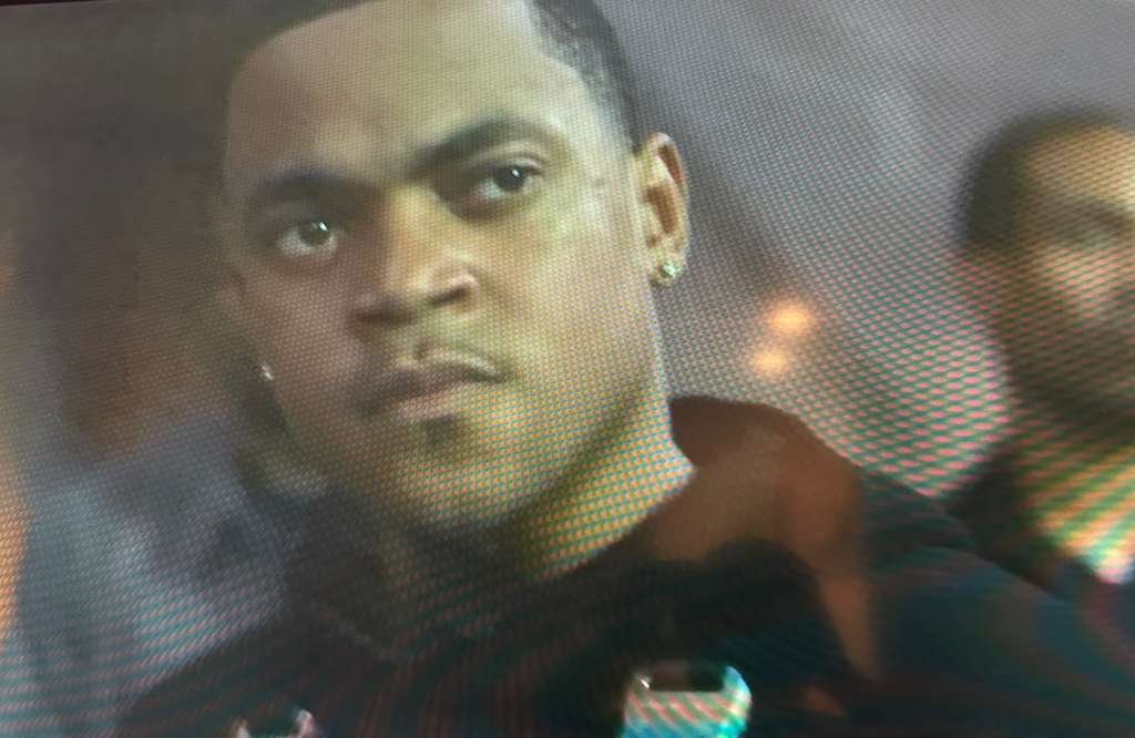 Tariq St. Patrick answering a tense call in a dramatic Power Book IV Force finale moment.