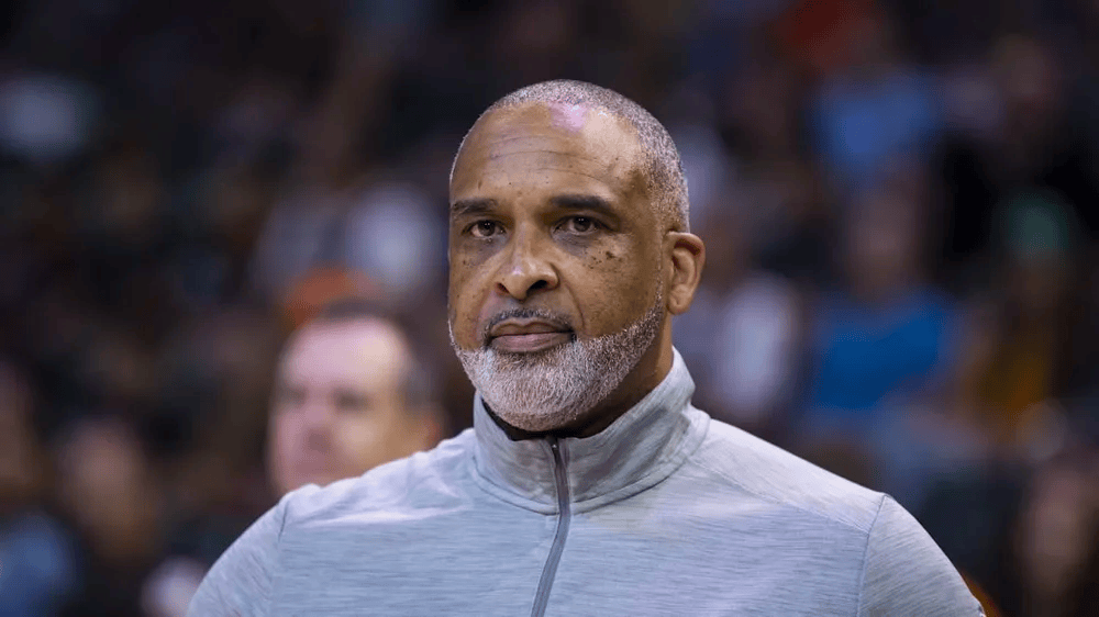 NBA coach Phil Handy during practice discussing basketball strategy