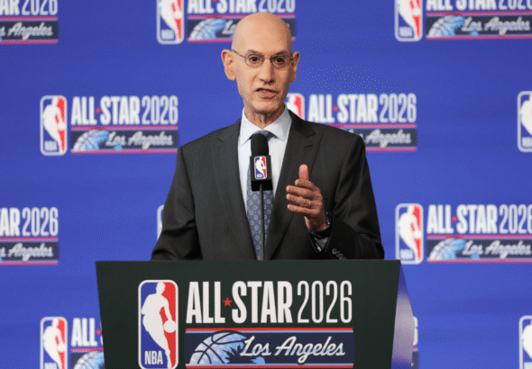 NBA Commissioner Adam Silver speaking at a press conference, waves and gestures while discussing potential league expansion with Seattle and Las Vegas mentioned as possible future teams